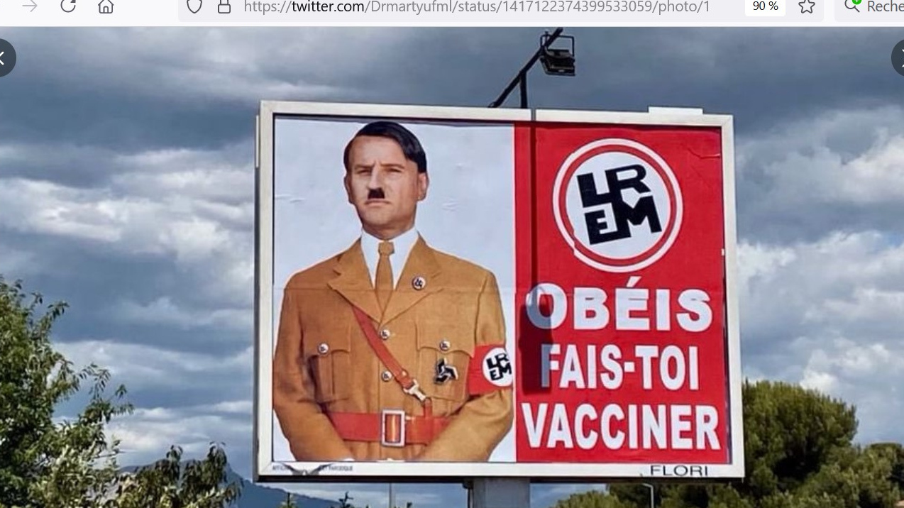 Скриншот страницы Twitter пользователя DrMartyUFML-S с фотографией рекламного щита, представляющего Эммануэля Макрона в образе Гитлера